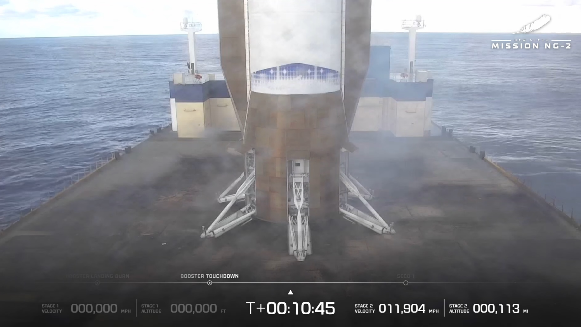 航天图片资料 · a large white-and-blue rocket stands upright on a boat at sea