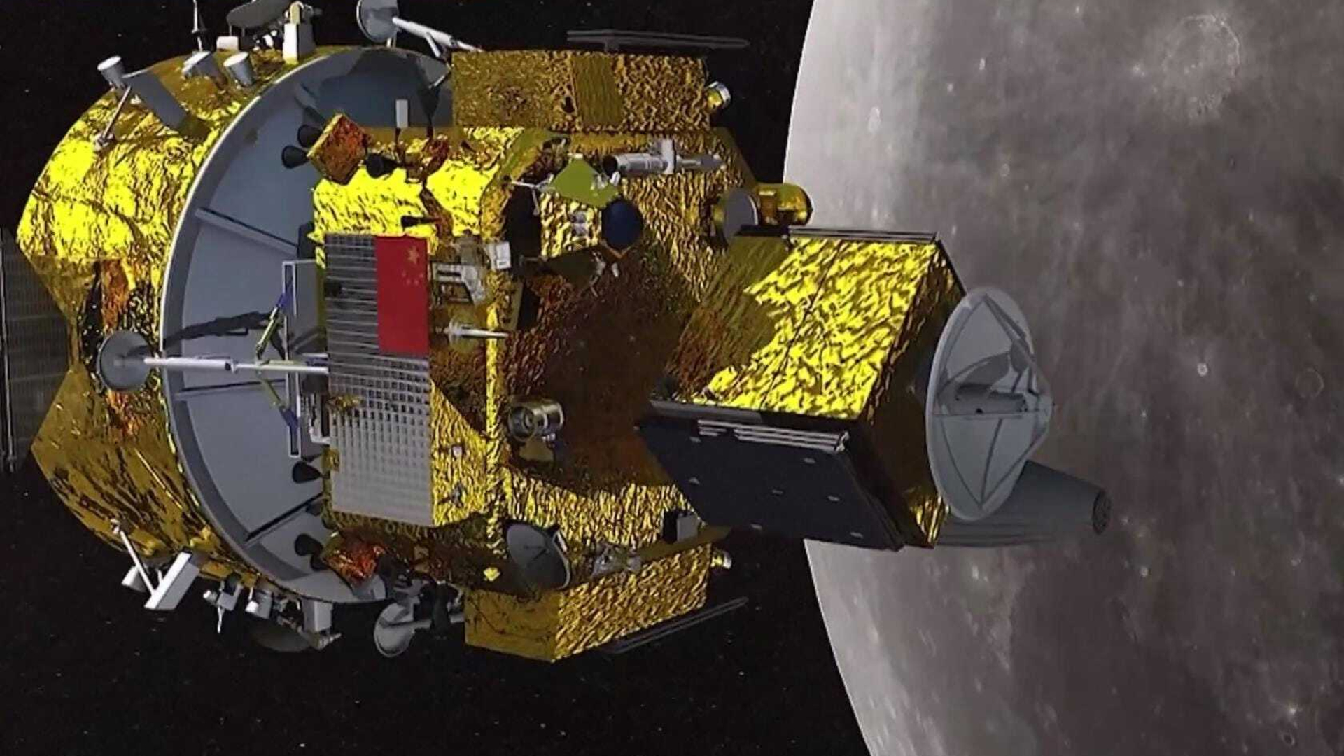 航天图片资料 · An illustration of a spacecraft covered in gold foil next to the moon in space