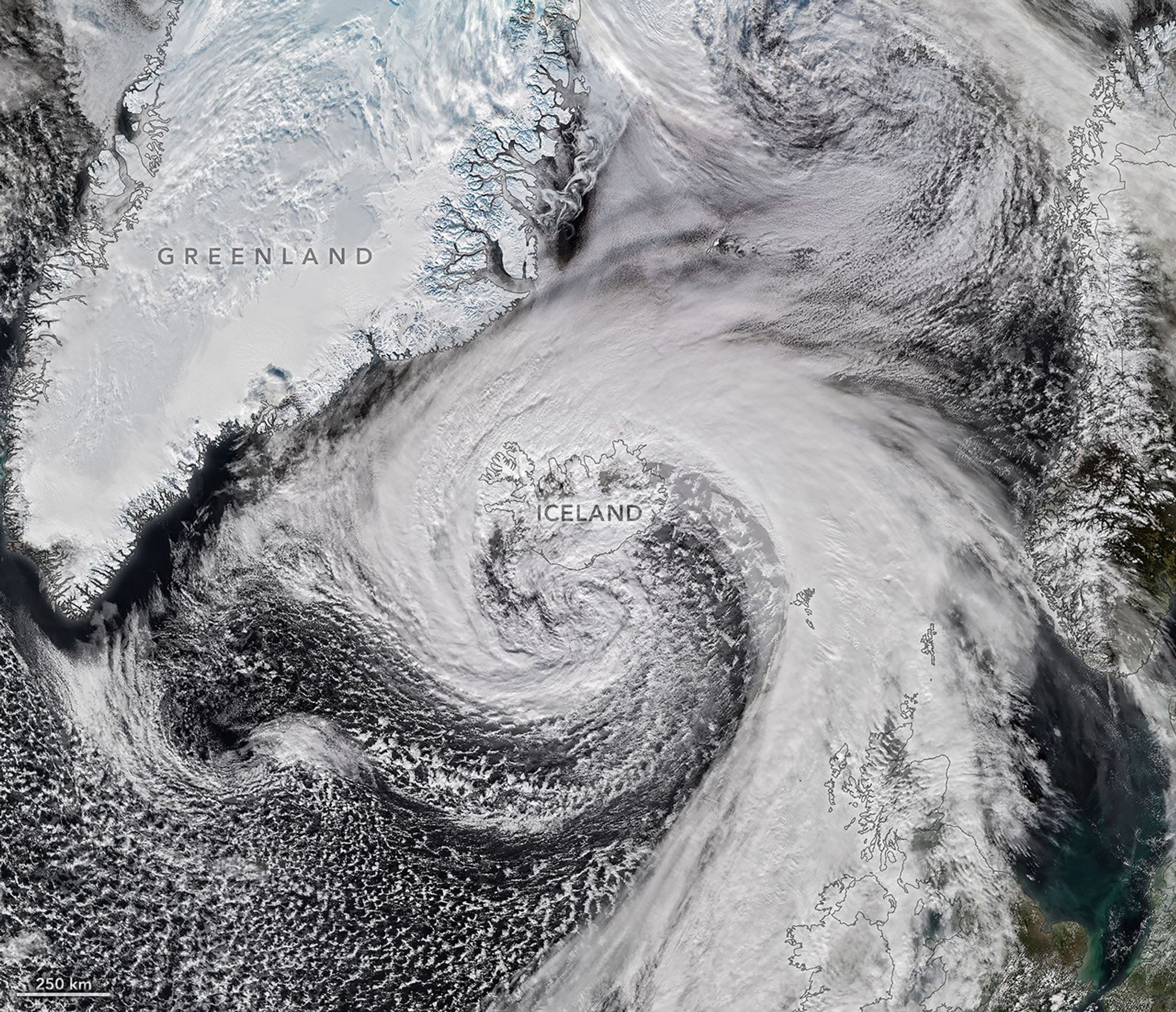 航天图片资料 · Storm clouds in an expanding spiral are centered near southern Iceland. The system extends across the North Atlantic from Greenland to the UK.
