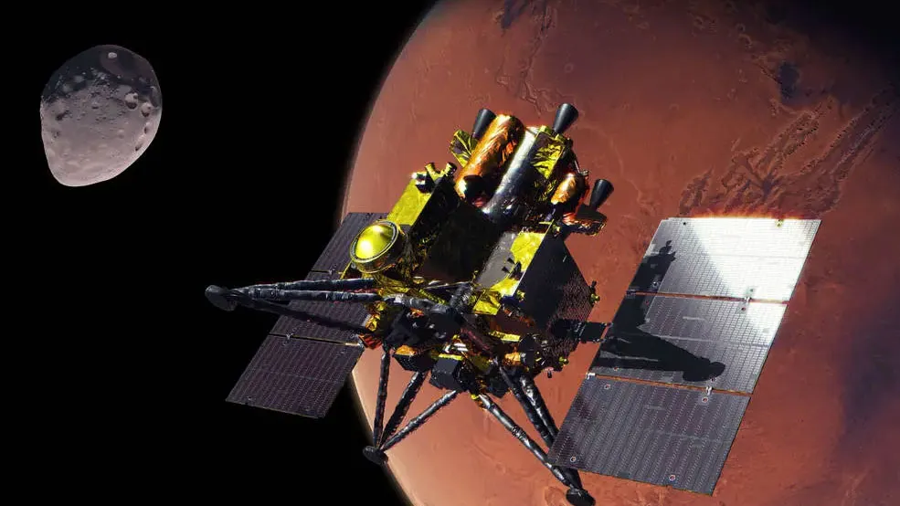 航天图片资料 · An artist’s concept of JAXA’s gold-foiled Martian Moons eXploration (MMX) spacecraft at Mars with an odd-shaped moon in the background.