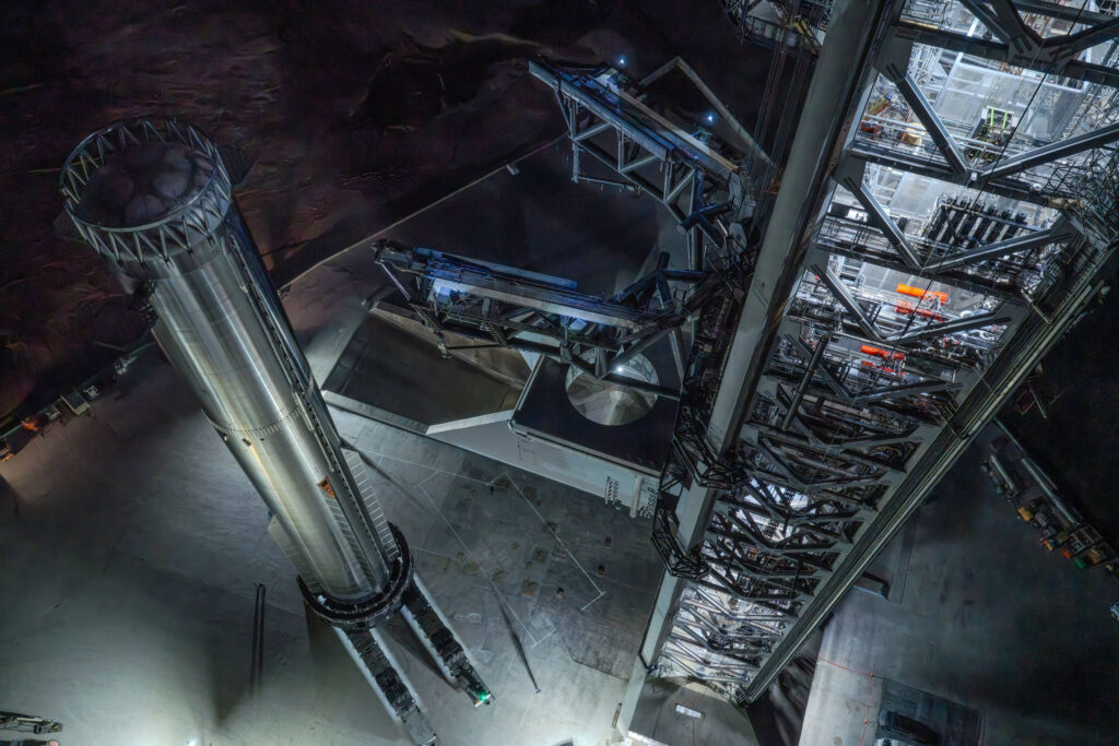 航天图片资料 · Aerial view of the Flight 14 Starship Super Heavy Booster 21 (left) and the Starbase Pad 2 launch tower (right).