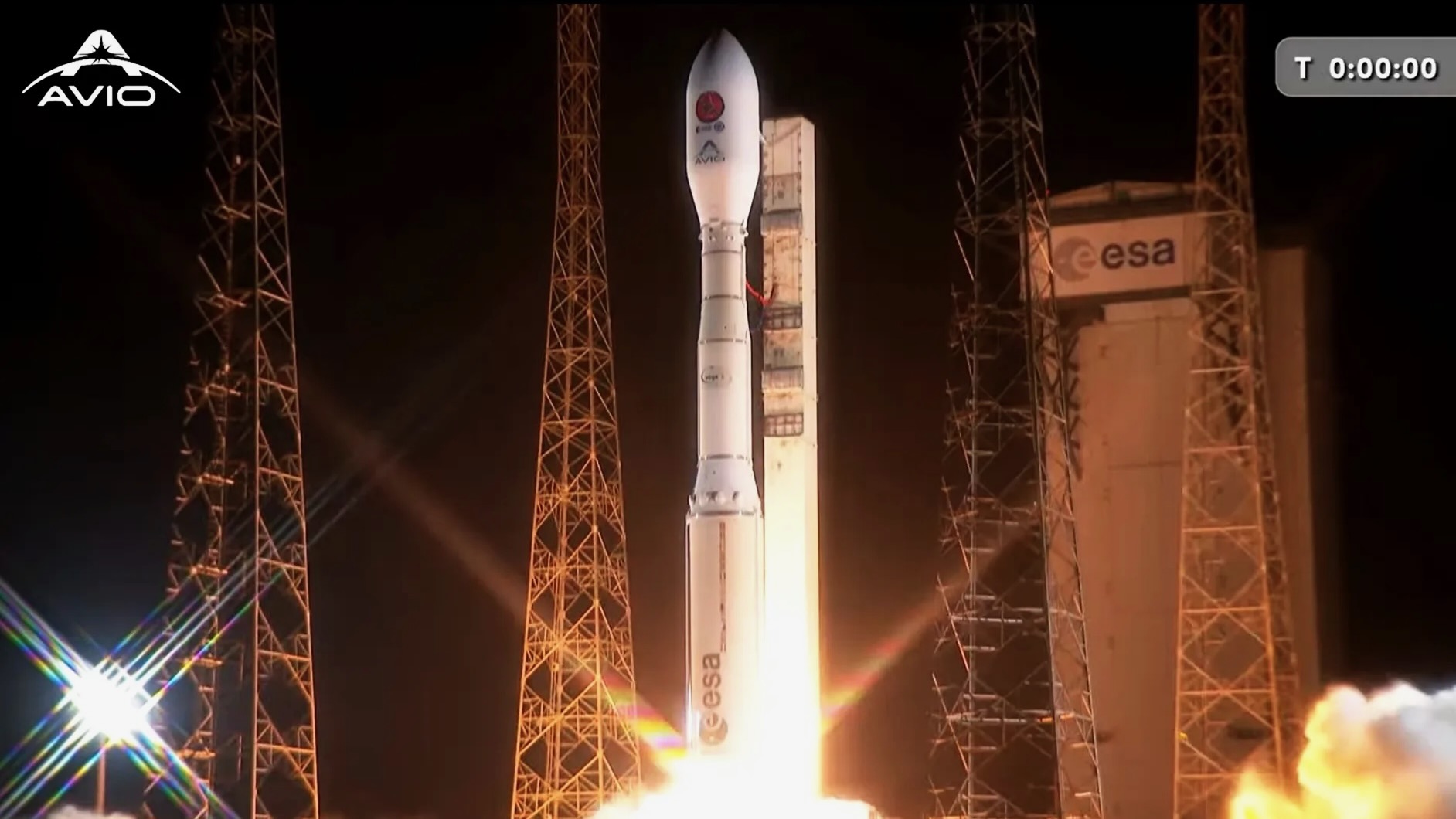 航天图片资料 · a white rocket launches into a dark night sky