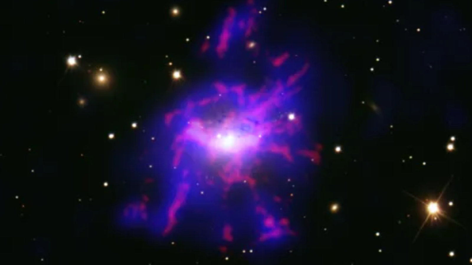 航天图片资料 · A large purple spiral against a black background