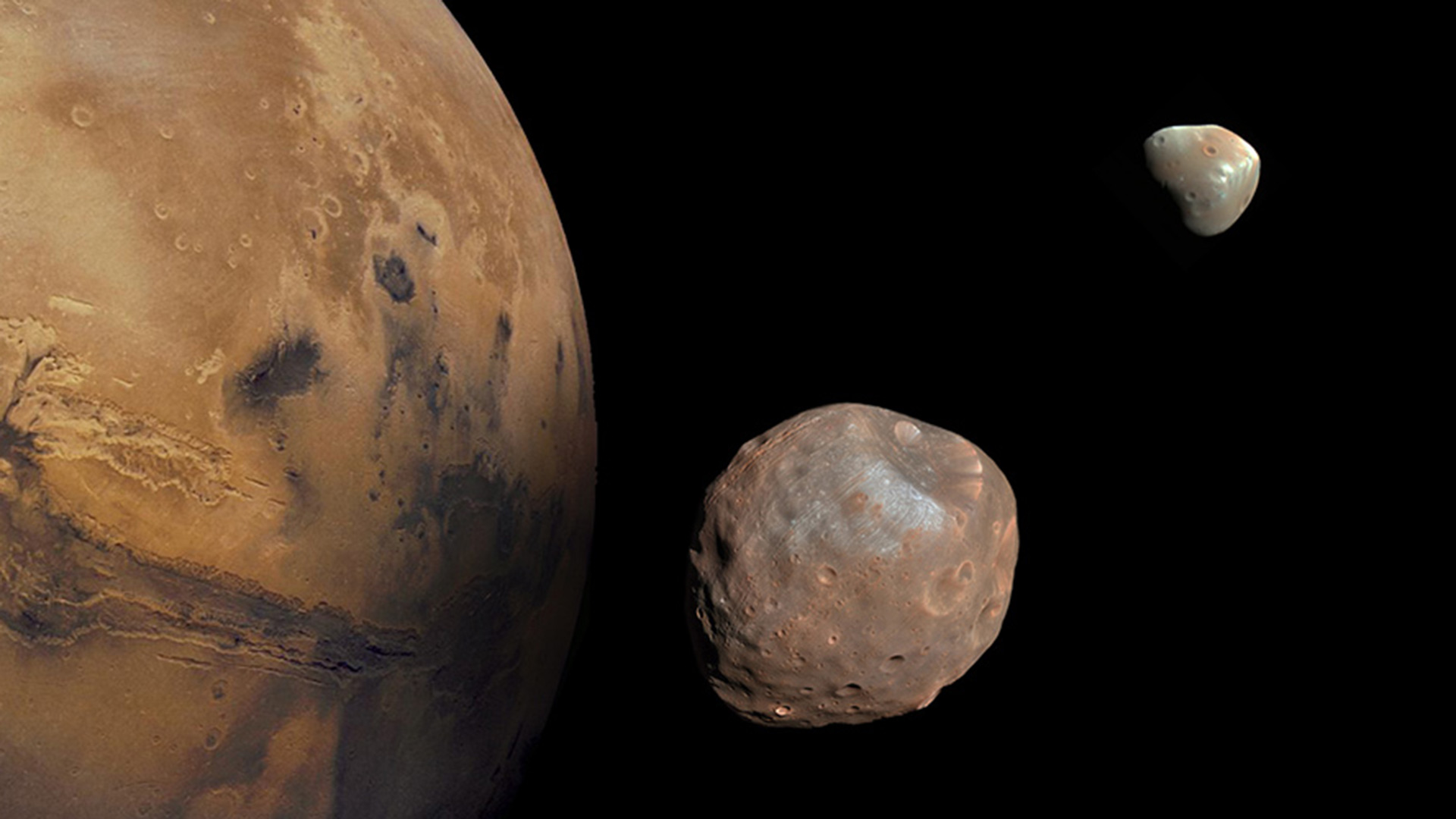 航天图片资料 · Mars and its two moons, Phobos and Deimos.