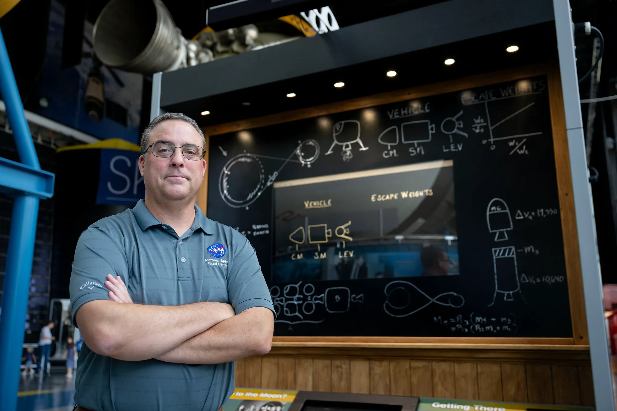 航天图片资料 · Tom Percy, manager of systems engineering and integration for NASA’s Human Landing Systems Program, stands in front of an Apollo Program lander exhibit at the U.S. Space and Rocket Center in Huntsville near NASA’s Marshall Space Flight Center.