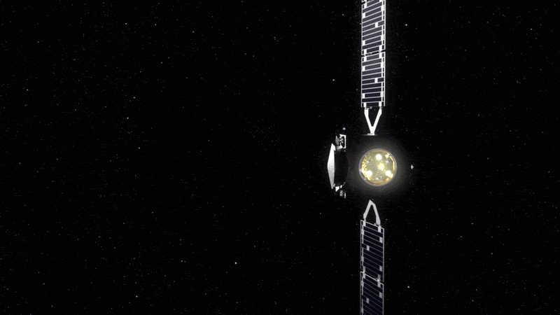 航天图片资料 · a cube-shaped spacecraft with two wing-like solar panels glides across a starry black background