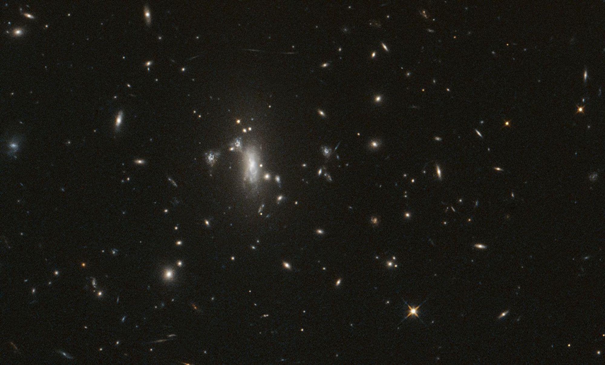 航天图片资料 · Several galaxies shine against black space, with a large cluster near center-left.