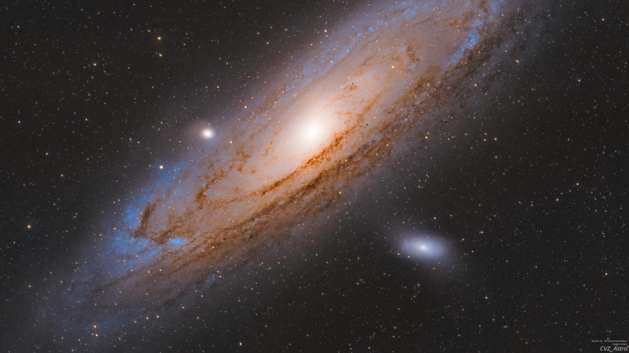 航天图片资料 · A spiral galaxy glows against a distant starfield in the blackness of space