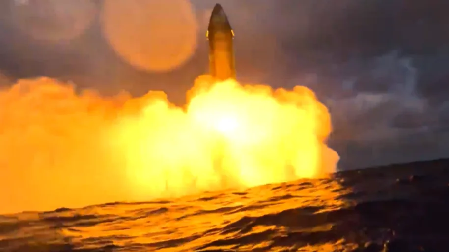 航天图片资料 · A big rocket fires its engines above the water.