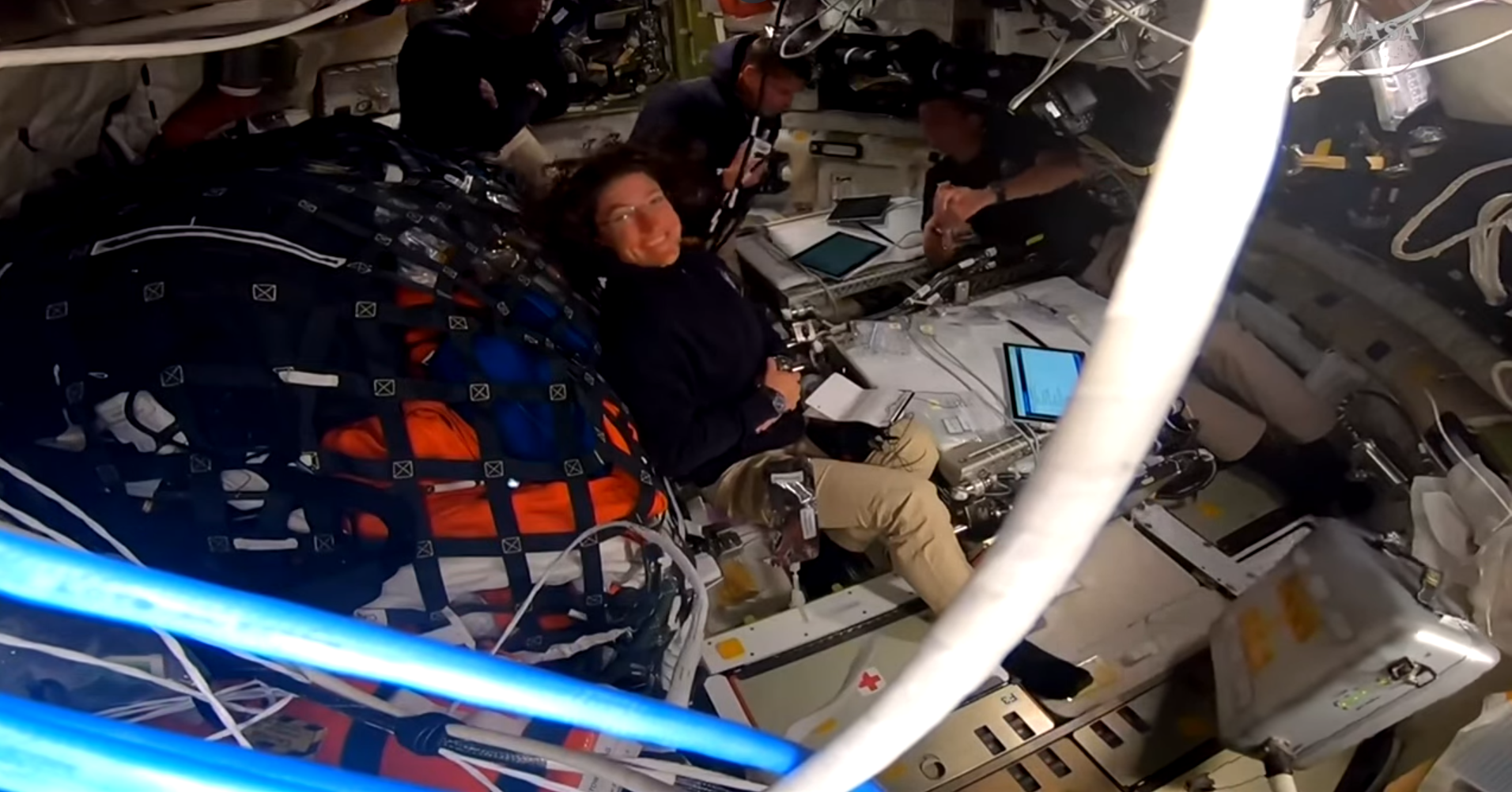 航天图片资料 · The Artemis II crew floats in Orion; NASA astronaut Christina Koch smiles at the camera as NASA a
