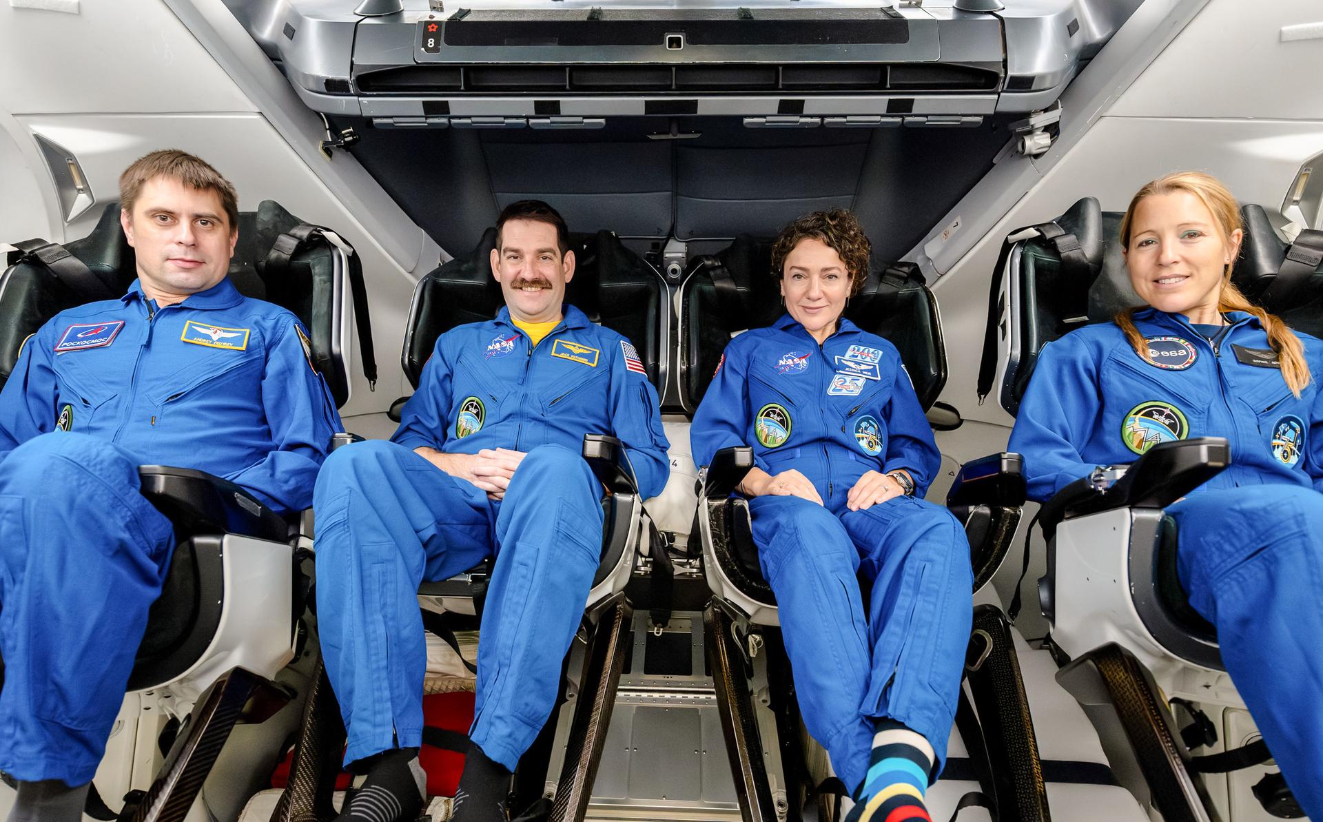航天图片资料 · The four members of NASA's SpaceX Crew-12 mission to the International Space Station pose together for a crew portrait inside a SpaceX Dragon spacecraft at SpaceX headquarters in Hawthorne, California. From left are, Roscosmos cosmonaut and Mission Specialist Andrey Fedyaev, NASA astronauts Jack Hathaway and Jessica Meir, Pilot and Commander respectively, and ESA (European Space Agency) astronaut and Mission Specialist Sophie Adenot.