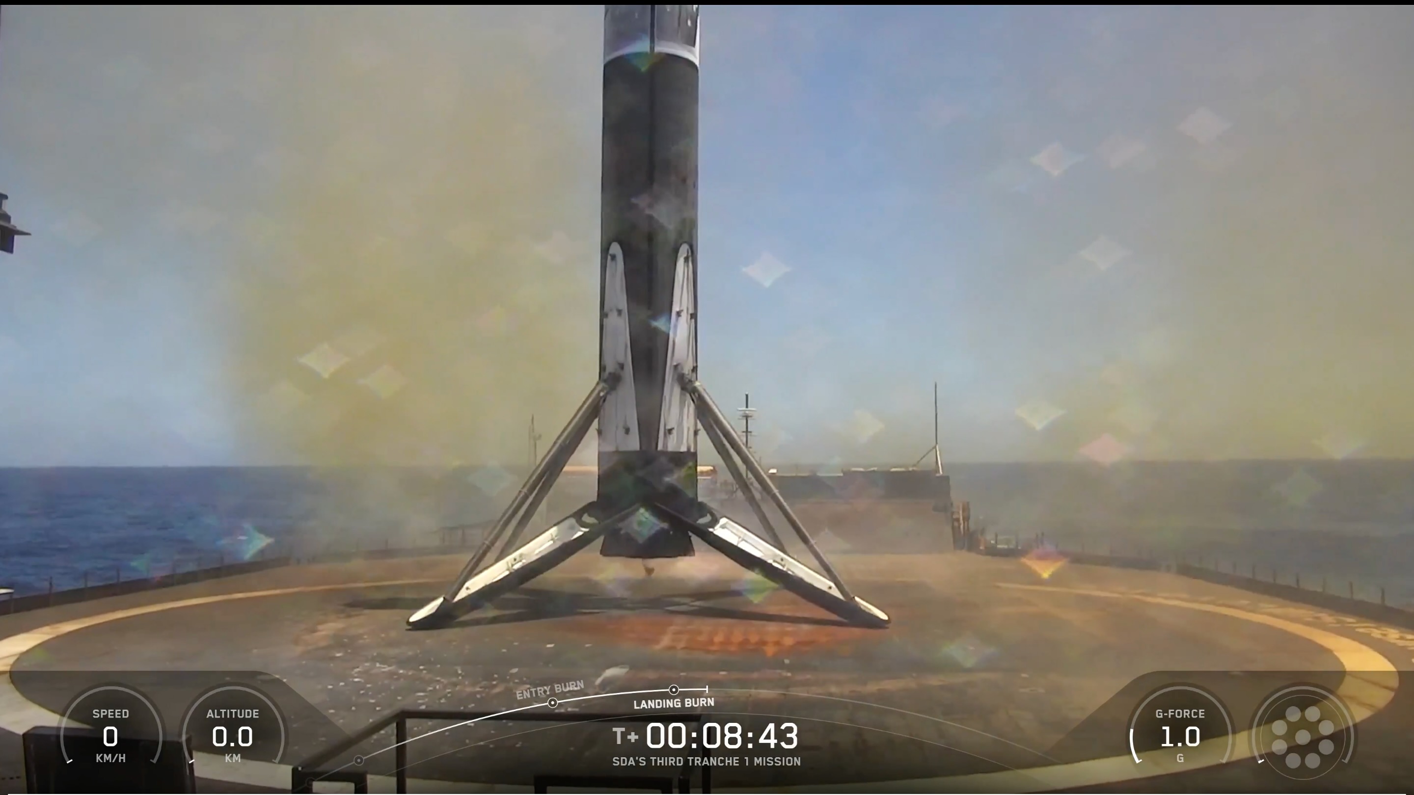 航天图片资料 · a black and white rocket rests on the deck of a ship at sea
