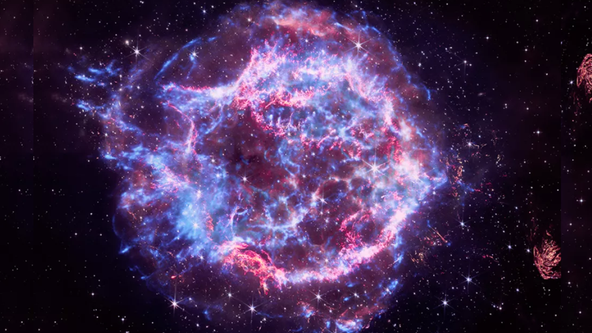 航天图片资料 · A sphere of neblous purple, pink and blue wispy smoke