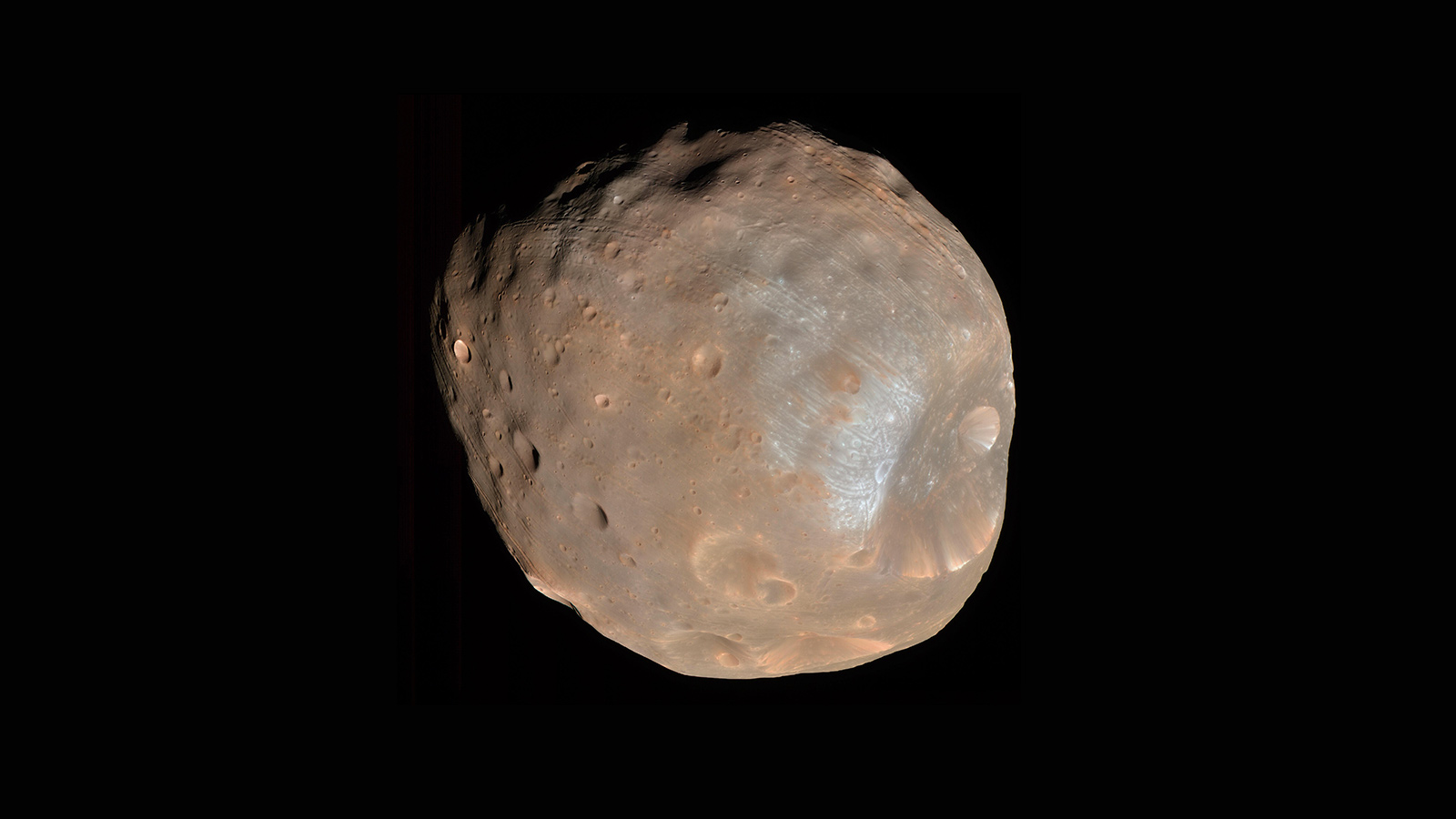 航天图片资料 · Phobos is the larger of Mars' two small moons and bears the scars of millennia of small impacts.