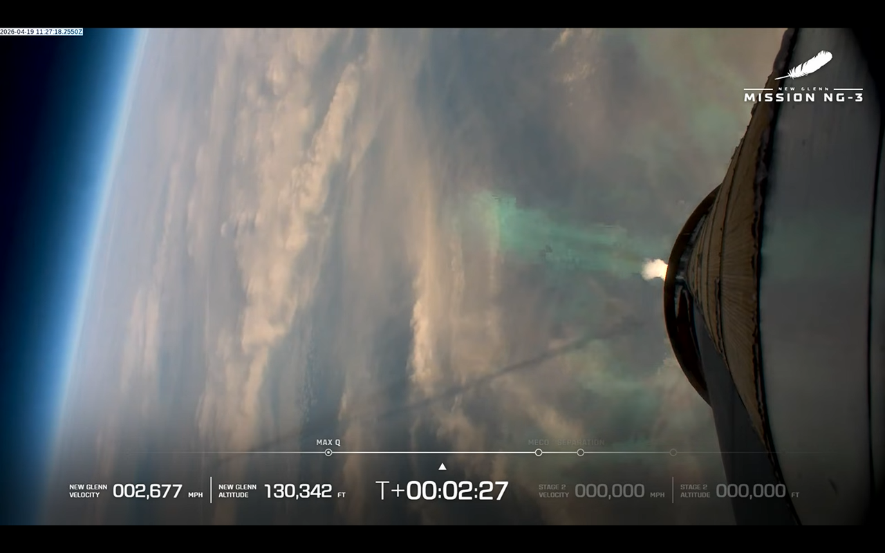 航天图片资料 · A view of Earth during the launch of Blue Origin's NG-New Glenn rocket as seen from the booster. The shadow of its exhaust plume is visible across the left side of the image.