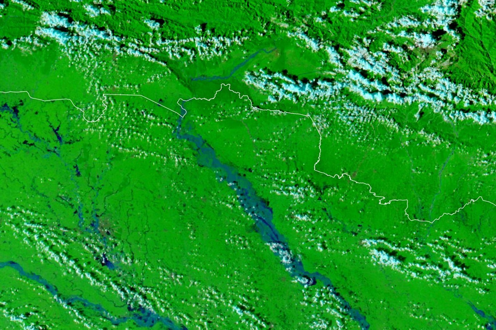 航天图片资料 · A false-color satellite image shows the same area during the flooding on September 29, 2026. The river appears much wider.