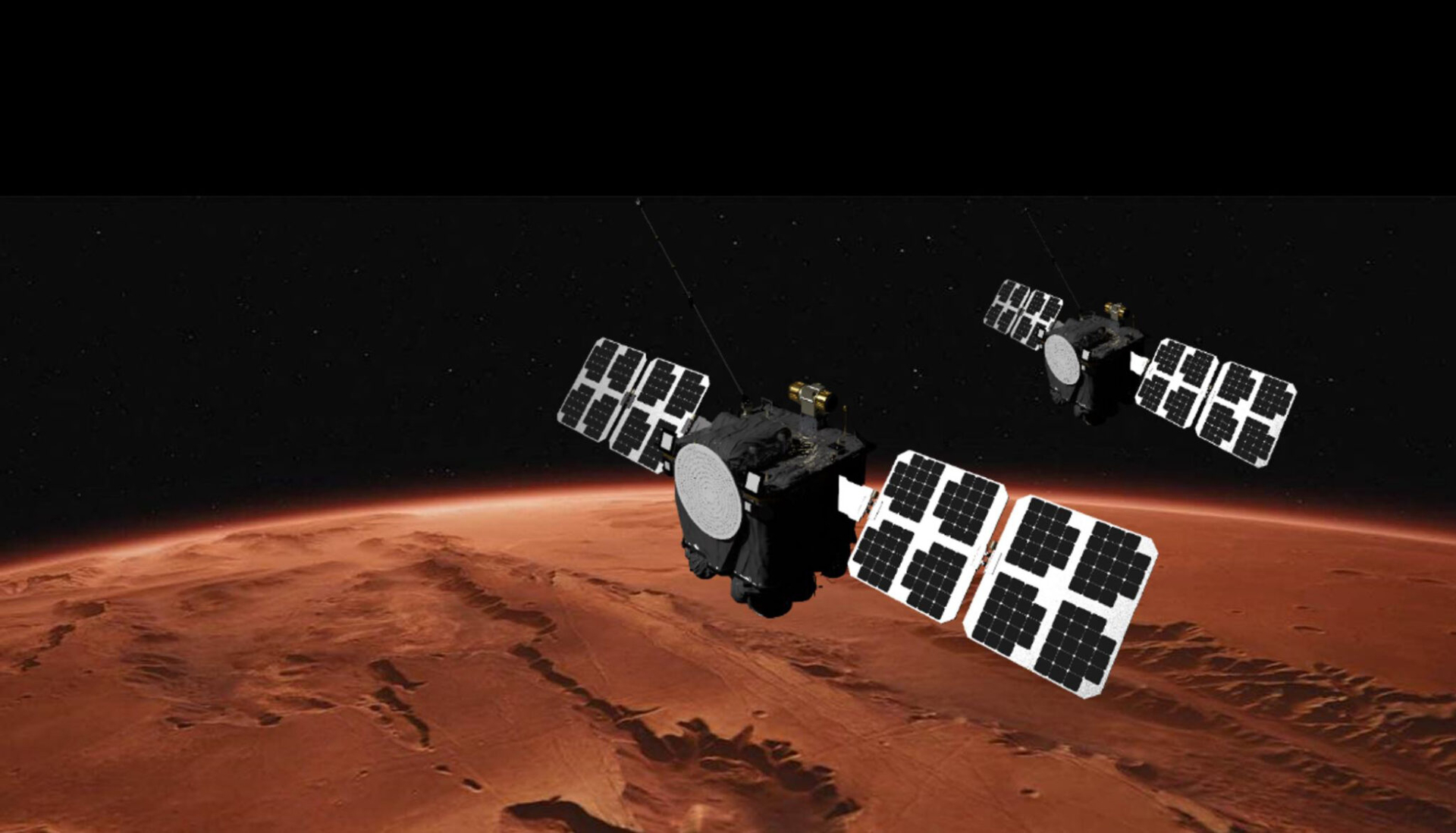 航天图片资料 · An illustration showing two large satellites with solar arrays on either side floating above the reddish-brownish surface of Mars.