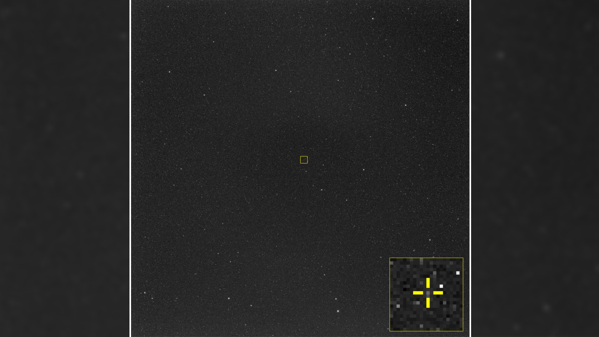 航天图片资料 · on a starry background, a small yellow crosshairs centers on a small dot
