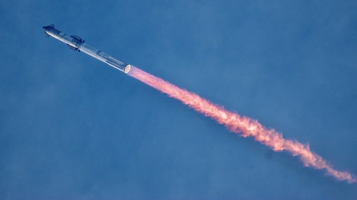 航天图片资料 · a giant rocket launches against a colorful sky