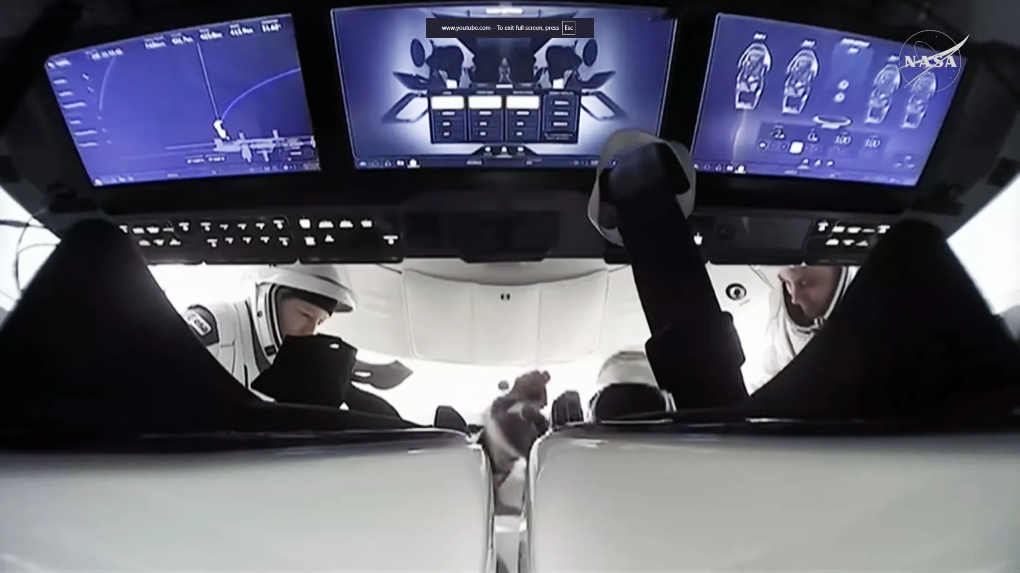 航天图片资料 · ESA astronaut Sophie Adenot (left) and Roscosmos cosmonaut Andrey Fedyaev are inside the SpaceX Dragon spacecraft preparing to undock from the International SPace Station.