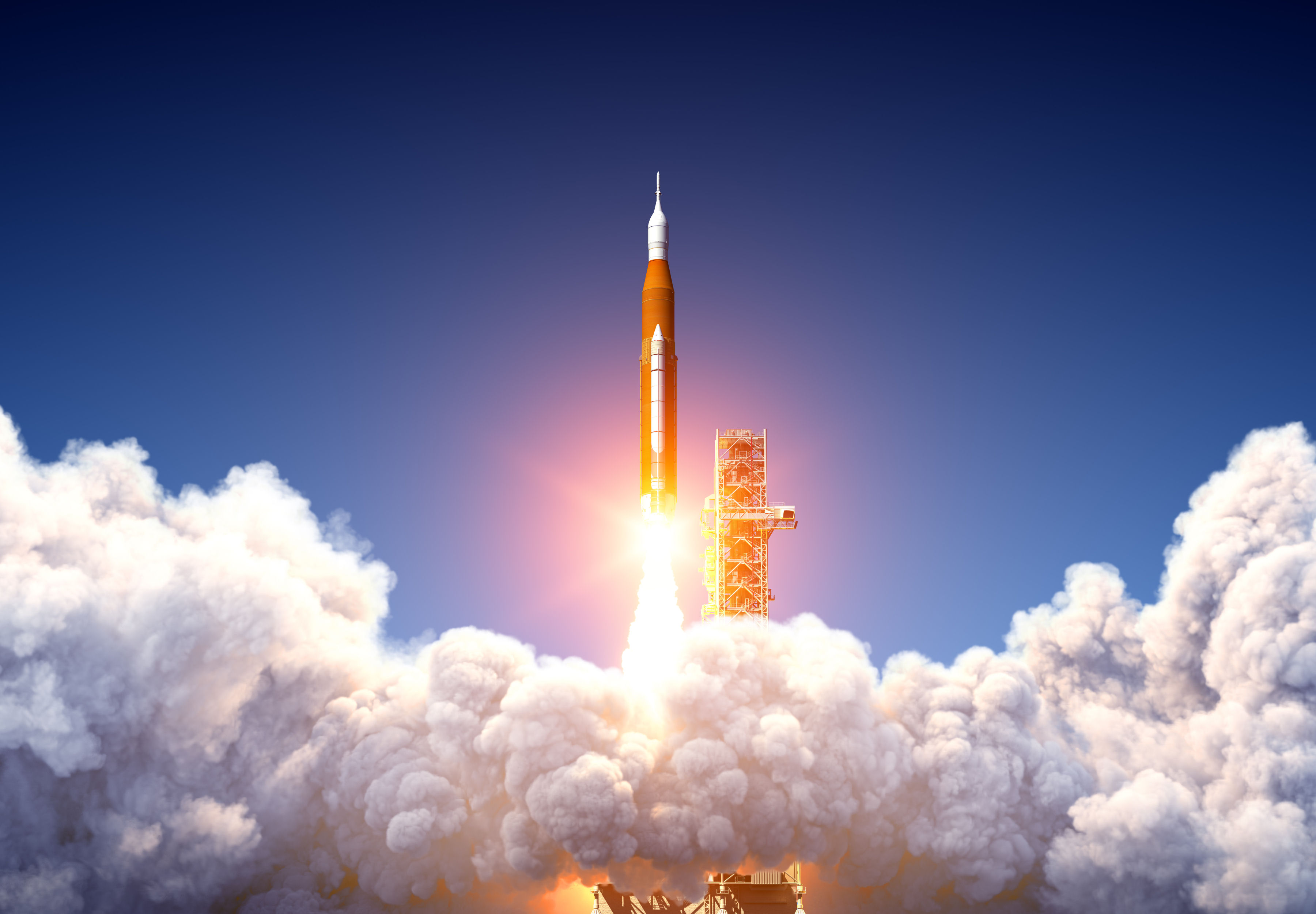 航天图片资料 · A rocket is lifting off of a launchpad.